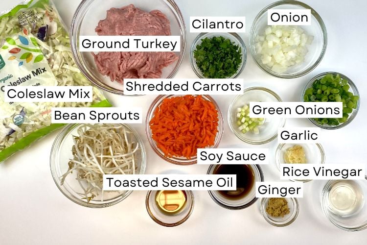 Ingredients for egg roll in a bowl in bowls.