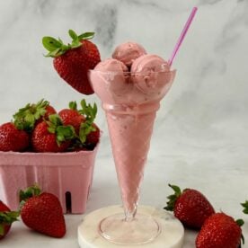 High Protein Strawberry Frozen Yogurt | Healthy Foodie Girl High Protein Strawberry Frozen Yogurt served in a cup.