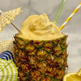best ever healthy dole whip | Healthy Foodie Girl Homemade healthy dole whip served in a pineapple.