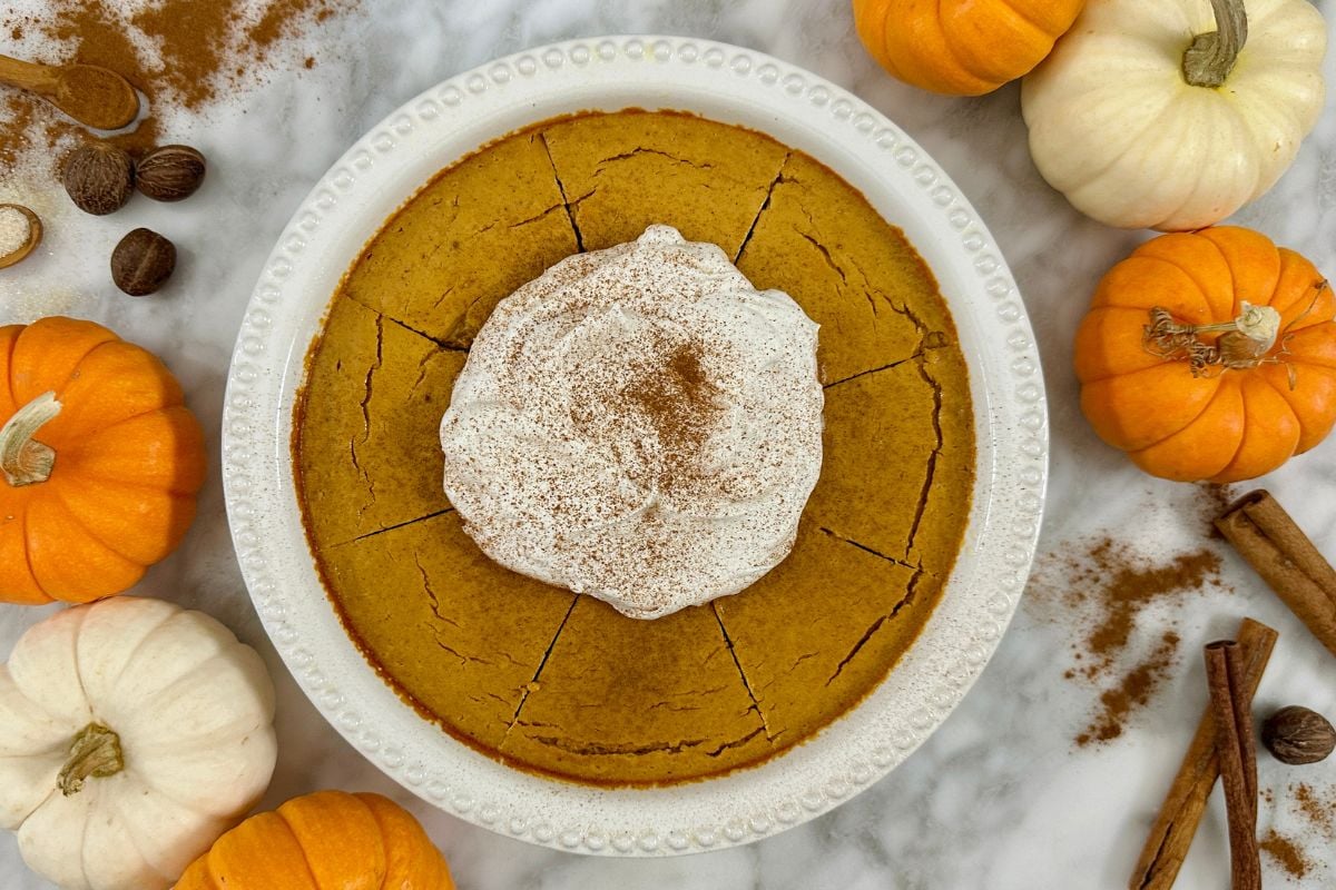 Baked pumpkin cheesecake in dish | Healthy Foodie Girl Baked pumpkin cheesecake in a dish.