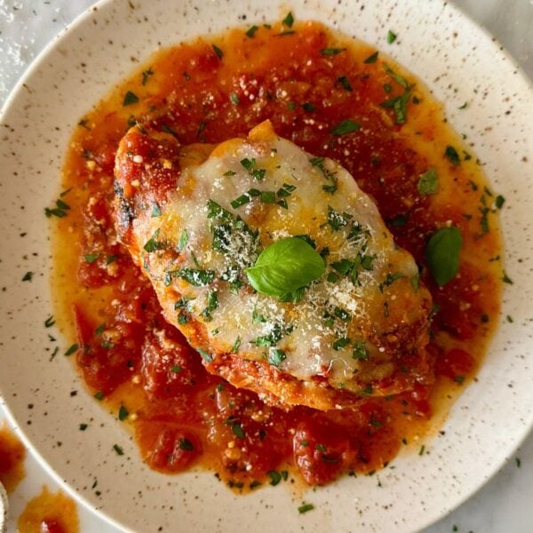 Healthy Slow Cooker Chicken Parmesan served on a plate.