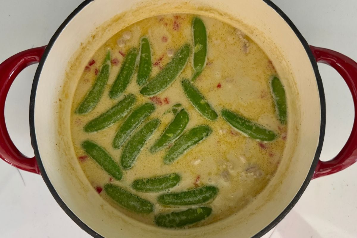 Sugar snap peas in Dutch oven for green curry chicken | Healthy Foodie Girl Sugar snap peas in Dutch oven for green curry chicken