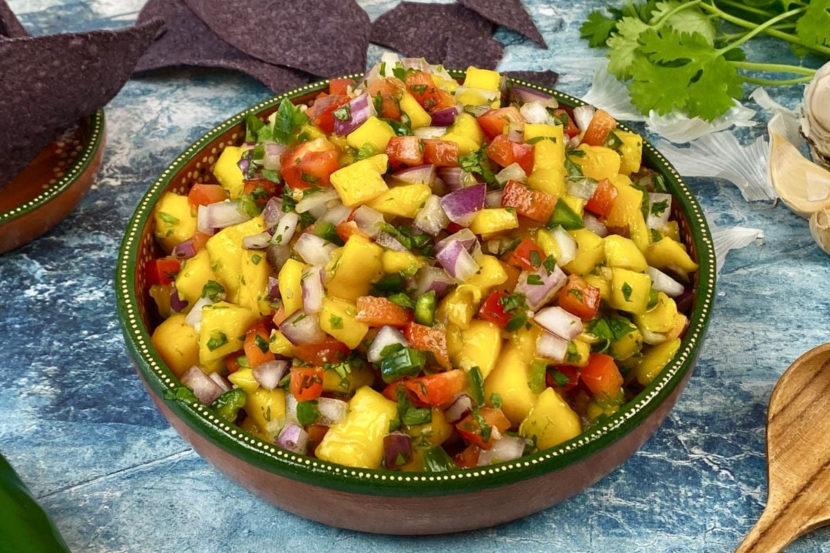 Homemade healthy mango salsa served in a bowl | Healthy Foodie Girl Homemade healthy mango salsa served in a bowl.