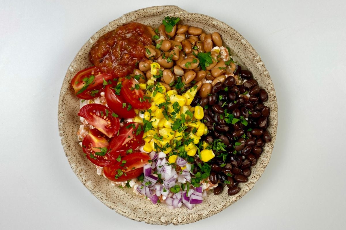 Cottage cheese bowl with savory toppings in a bowl | Healthy Foodie Girl Cottage cheese bowl with savory toppings in a bowl.