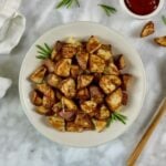 Air Fryer Red Potatoes cooked on a plate.