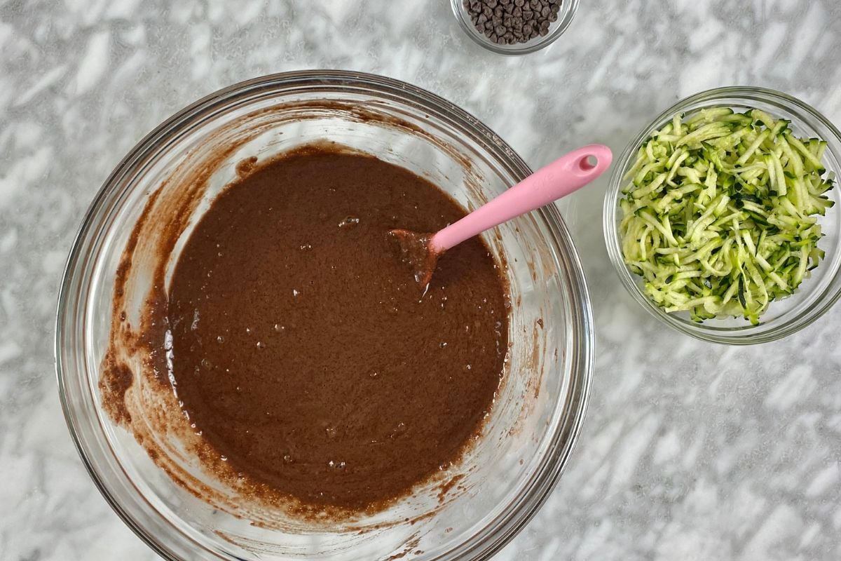 Chocolate zucchini muffins batter in a bowl.