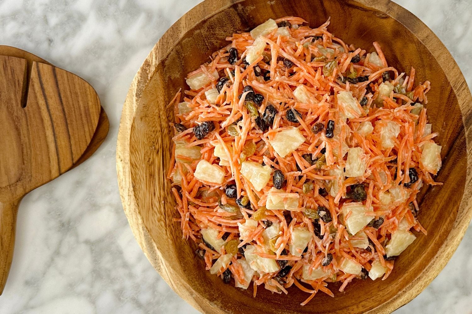 Carrot Raisin Salad | Healthy Foodie Girl Healthy Carrot Raisin Salad in a bowl.