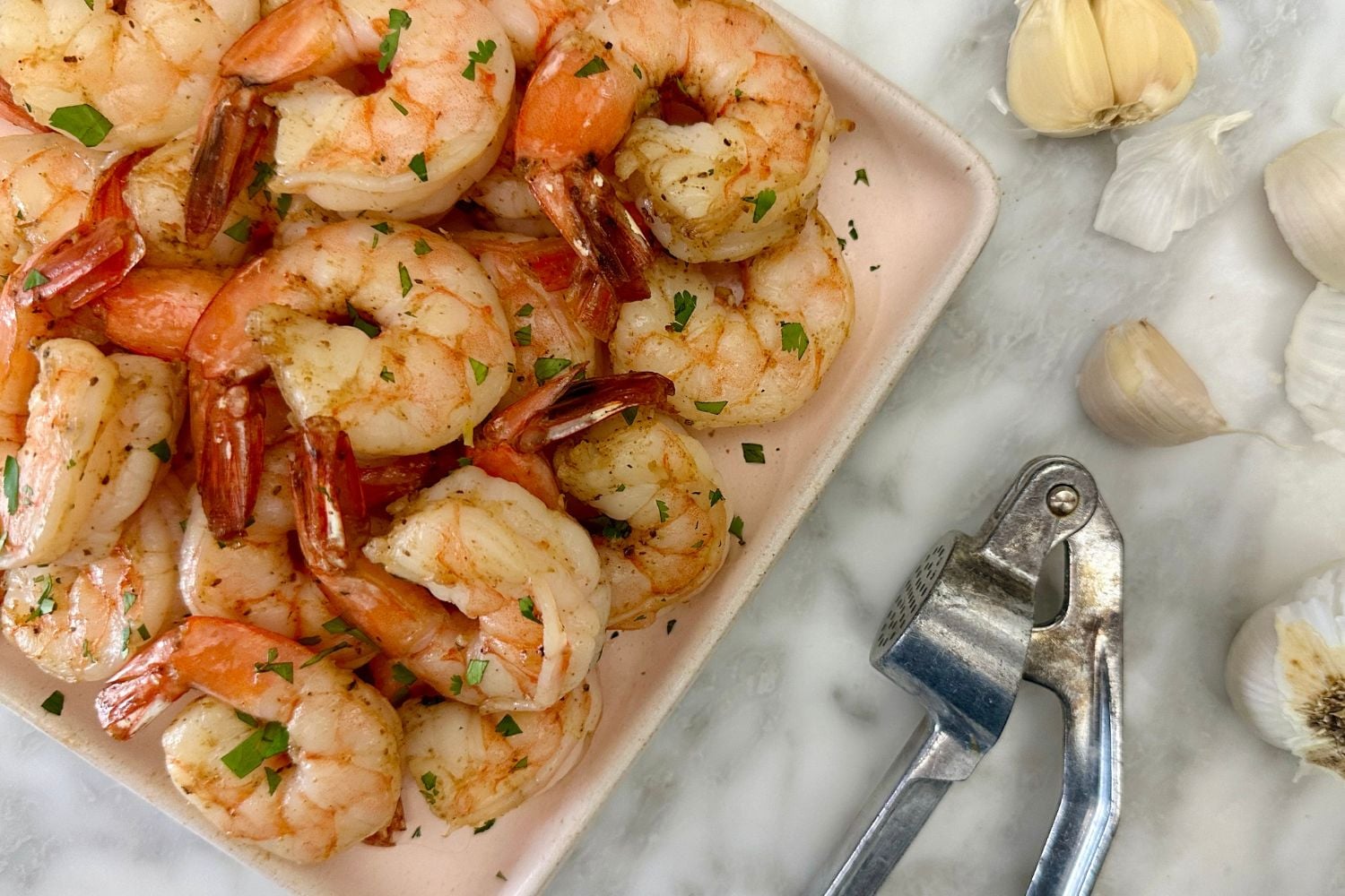 Air Fryer Shrimp | Healthy Foodie Girl Air Fryer Shrimp on a plate.