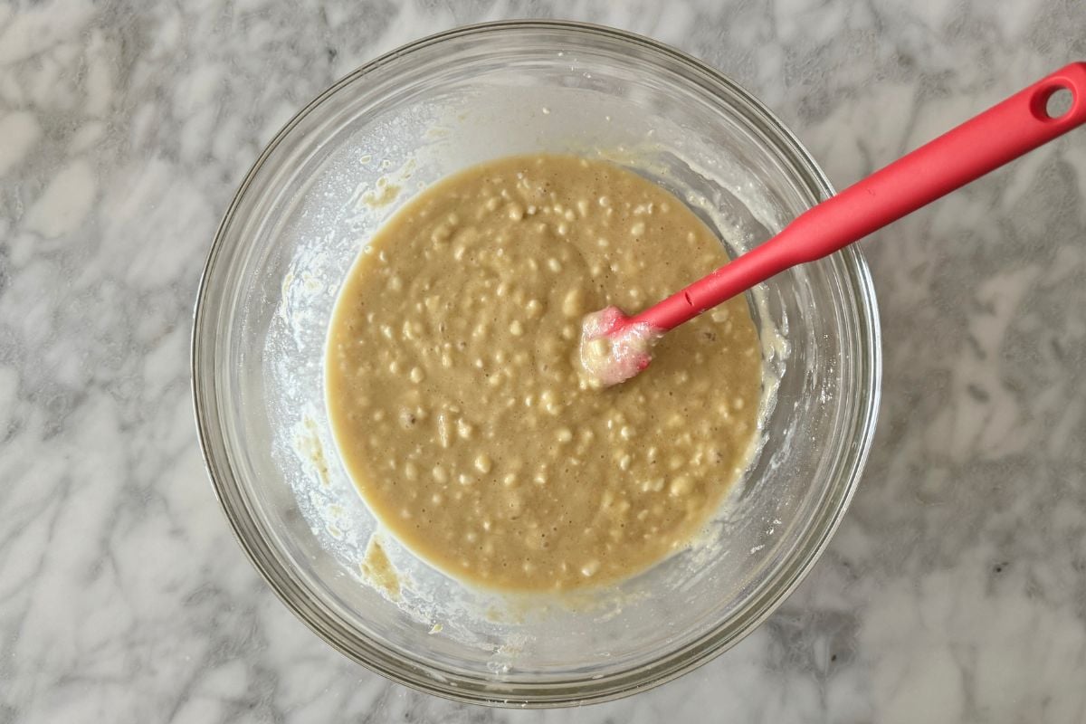 Muffin batter mixed in bowl for blueberry cottage cheese muffins | Healthy Foodie Girl Muffin batter mixed in a bowl for blueberry cottage cheese muffins.