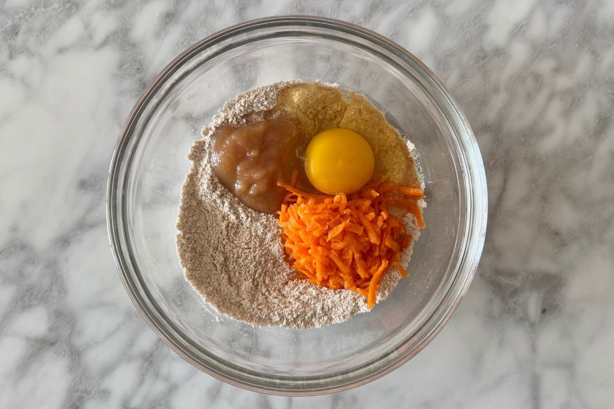 Wet ingredients for carrot cake mug cake in a bowl.