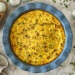 Crustless Sausage Quiche cooked in a quiche pan.