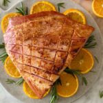 Honey and Orange Glazed Ham on a serving platter.