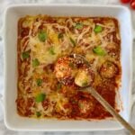 Healthy Chicken Parmesan Meatballs in a baking dish.