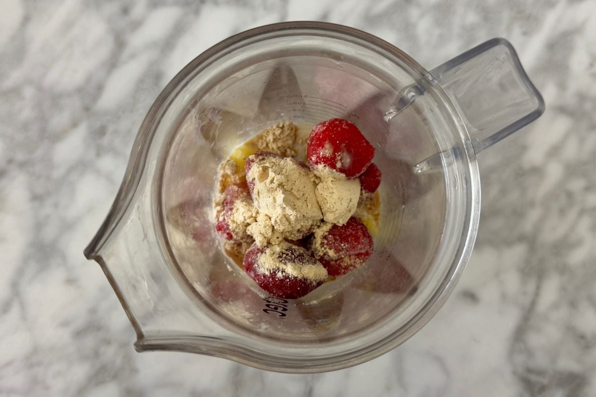 Homemade strawberry dole whip ingredients in blender | Healthy Foodie Girl Homemade strawberry dole whip ingredients in blender