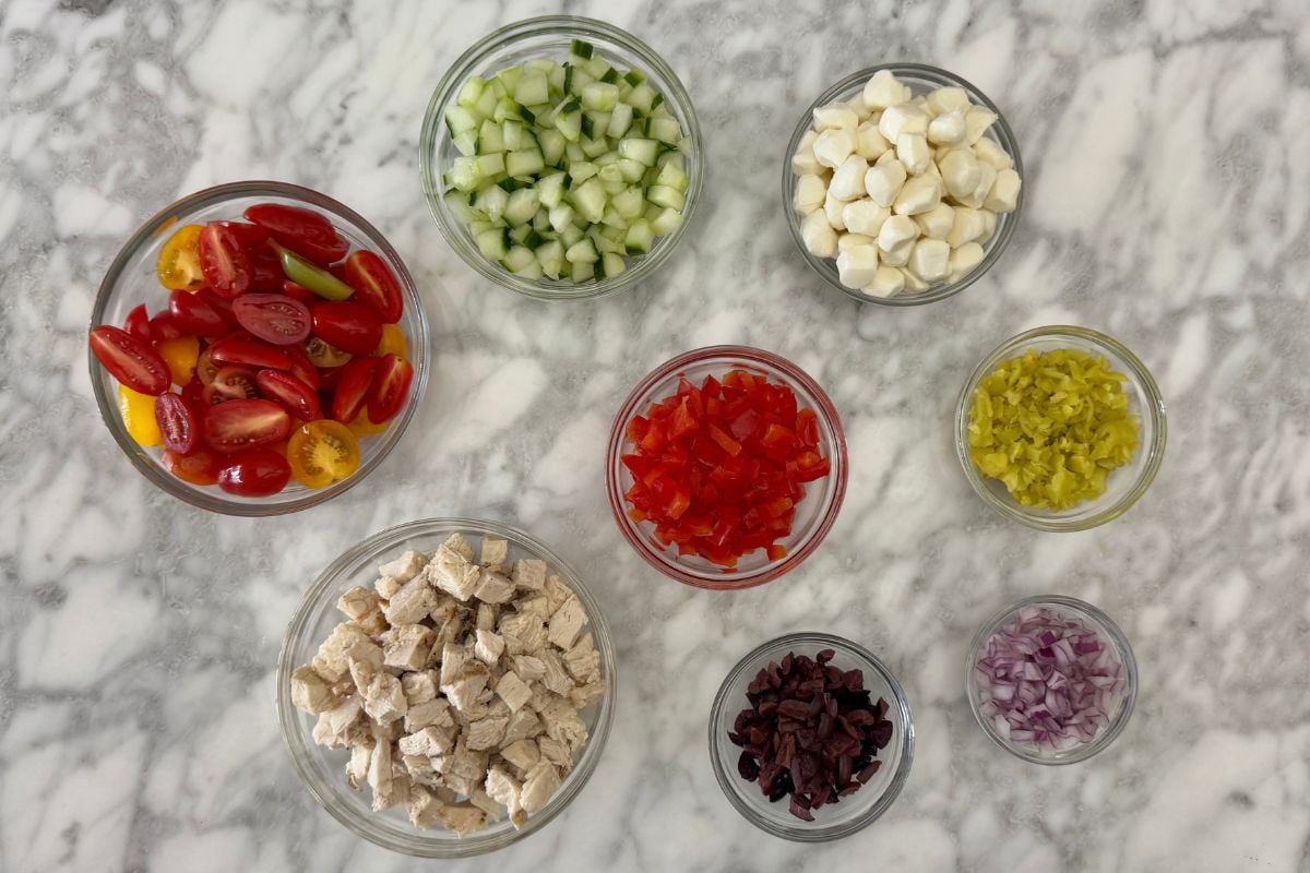 Prepared ingredients for Italian pasta salad