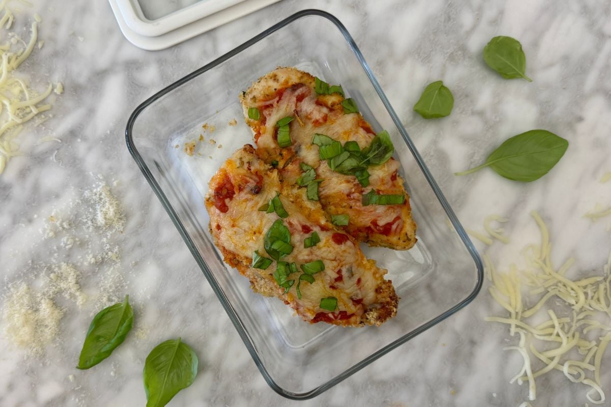 Air fryer chicken parmesan in a storage container | Healthy Foodie Girl Air fryer chicken parmesan in a storage container