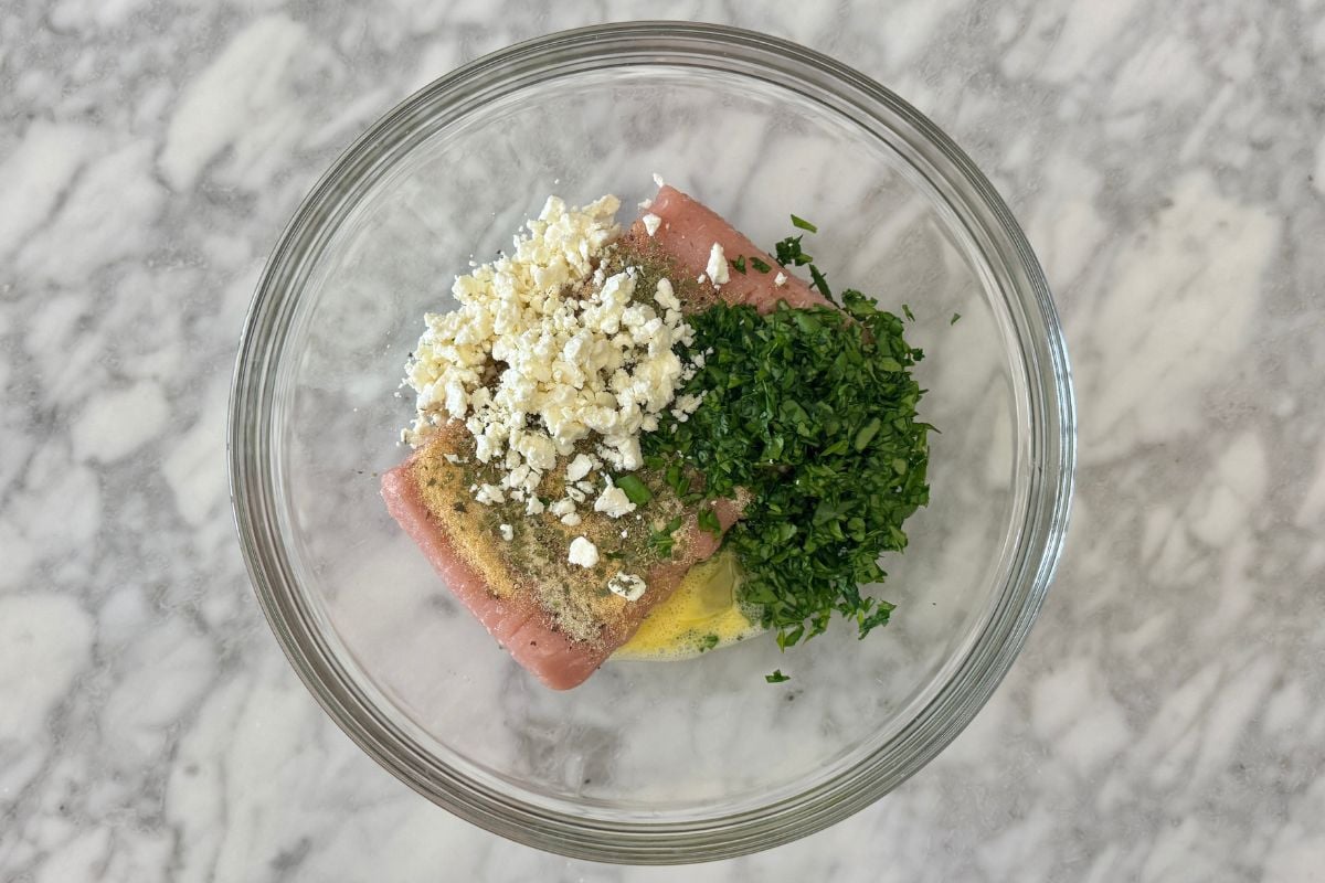 Ground turkey for spinach feta turkey burgers in bowl | Healthy Foodie Girl Ground turkey for spinach feta turkey burgers in bowl