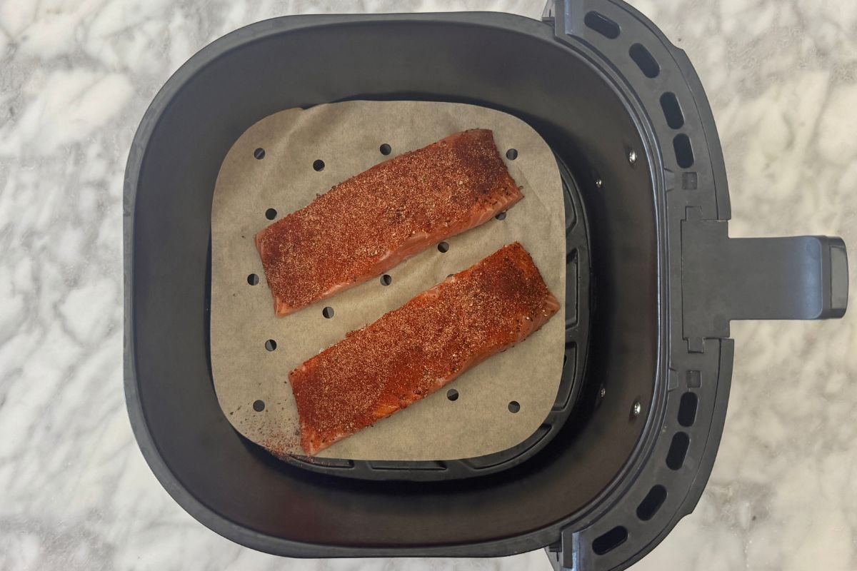 Salmon in an air fryer basket | Healthy Foodie Girl Salmon in an air fryer basket