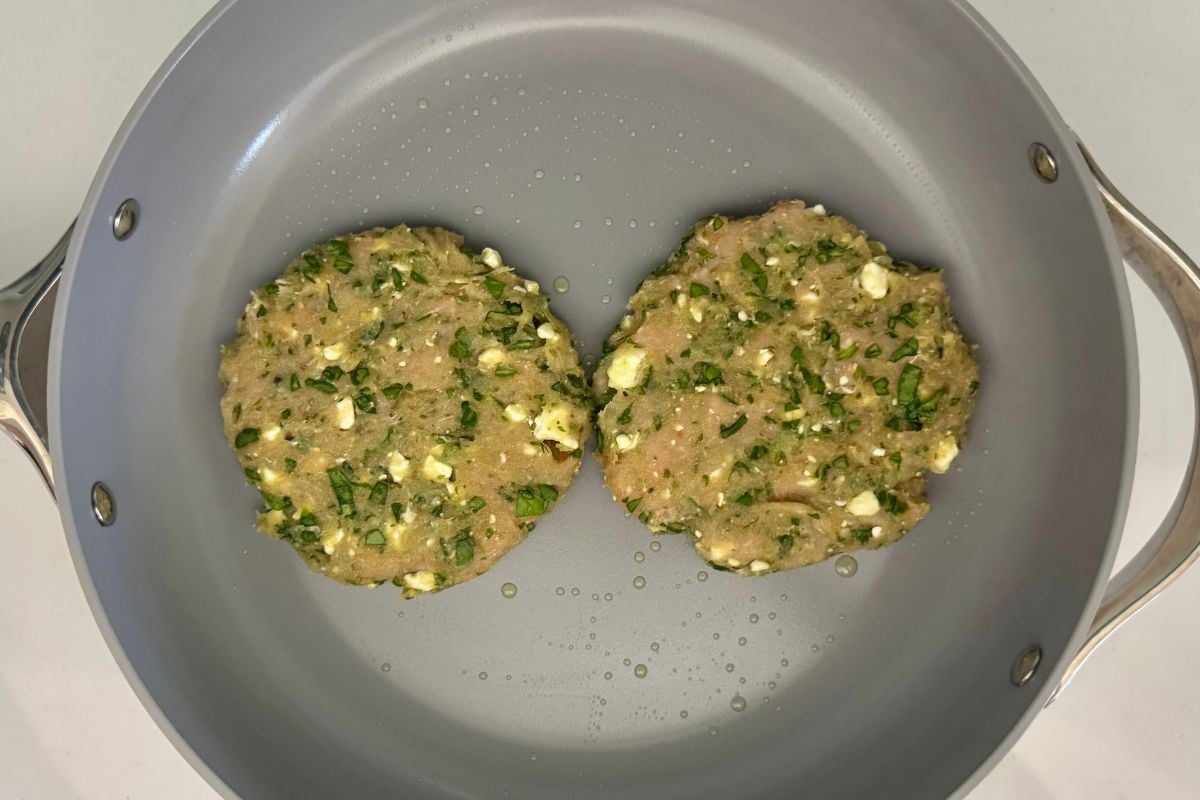 Spinach and feta turkey patties in pan | Healthy Foodie Girl Spinach and feta turkey patties in pan