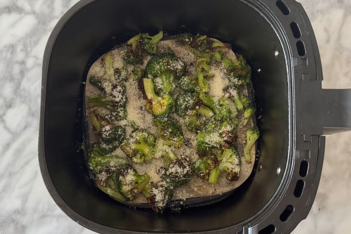 Air fryer frozen broccoli with Parmesan | Healthy Foodie Girl Air fryer frozen broccoli with Parmesan in air fryer basket