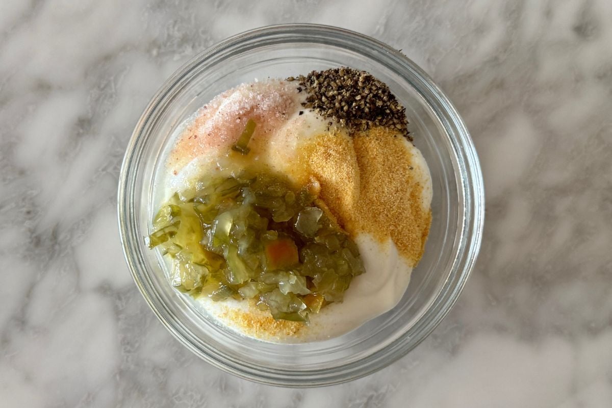 Ingredients for whipped cottage cheese sauce in bowl