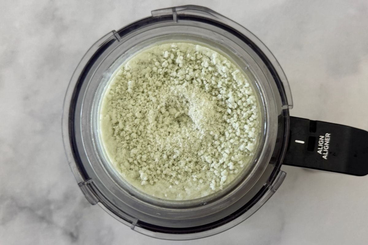 Ninja Creami mint chip ice cream mixture in container