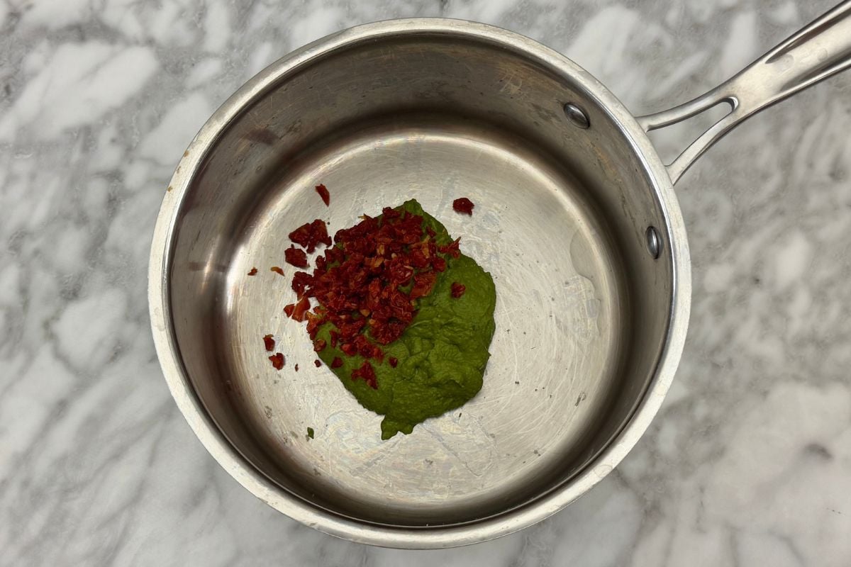 Pistachio pesto and sun-dried tomatoes in saucepan | Healthy Foodie Girl Pistachio pesto and sun-dried tomatoes in saucepan