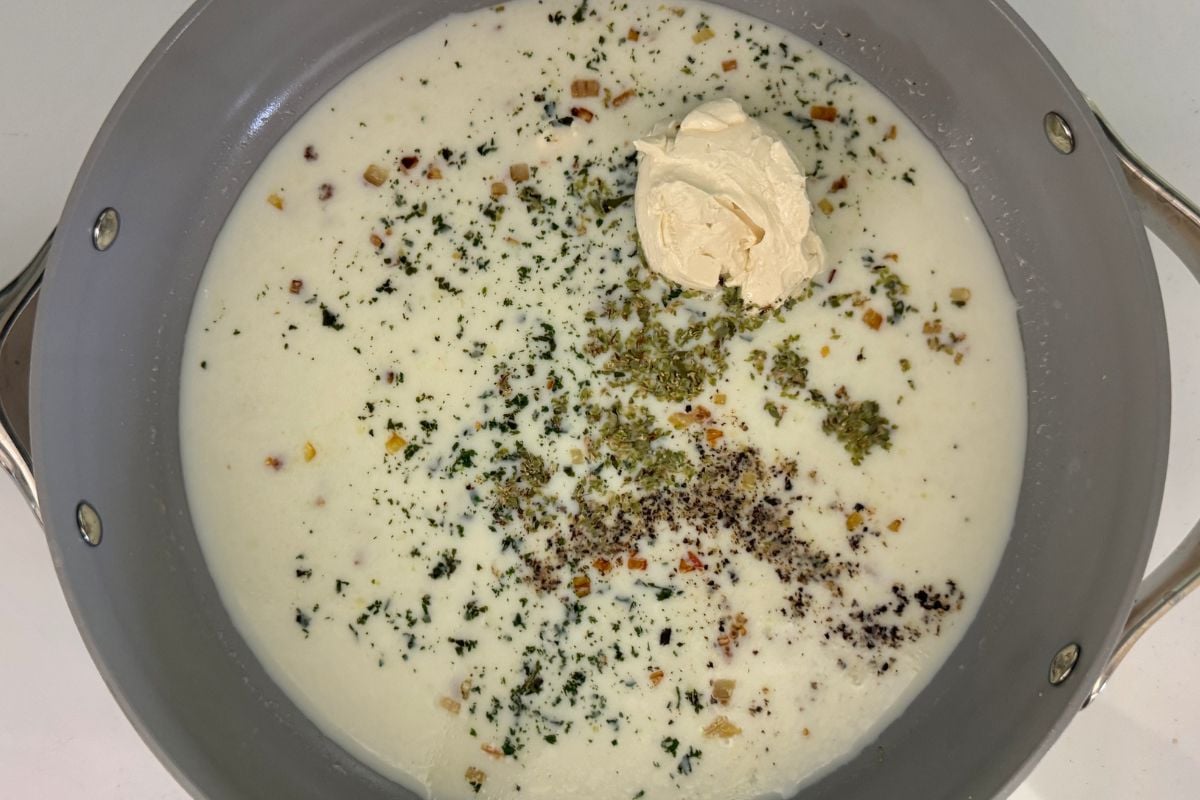 Milk in pan for Alfredo sauce