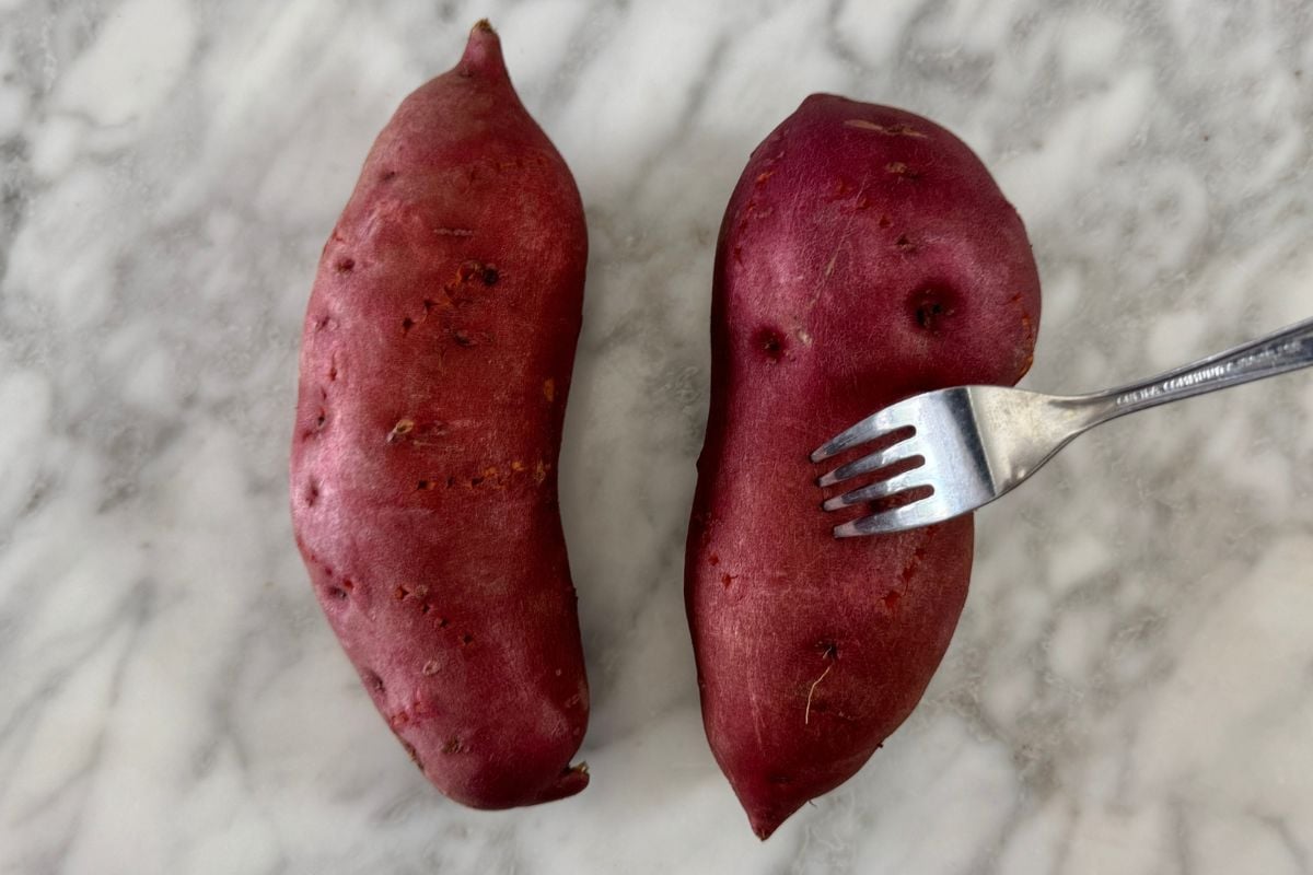 Sweet potatoes poked with a fork | Healthy Foodie Girl Sweet potatoes poked with a fork