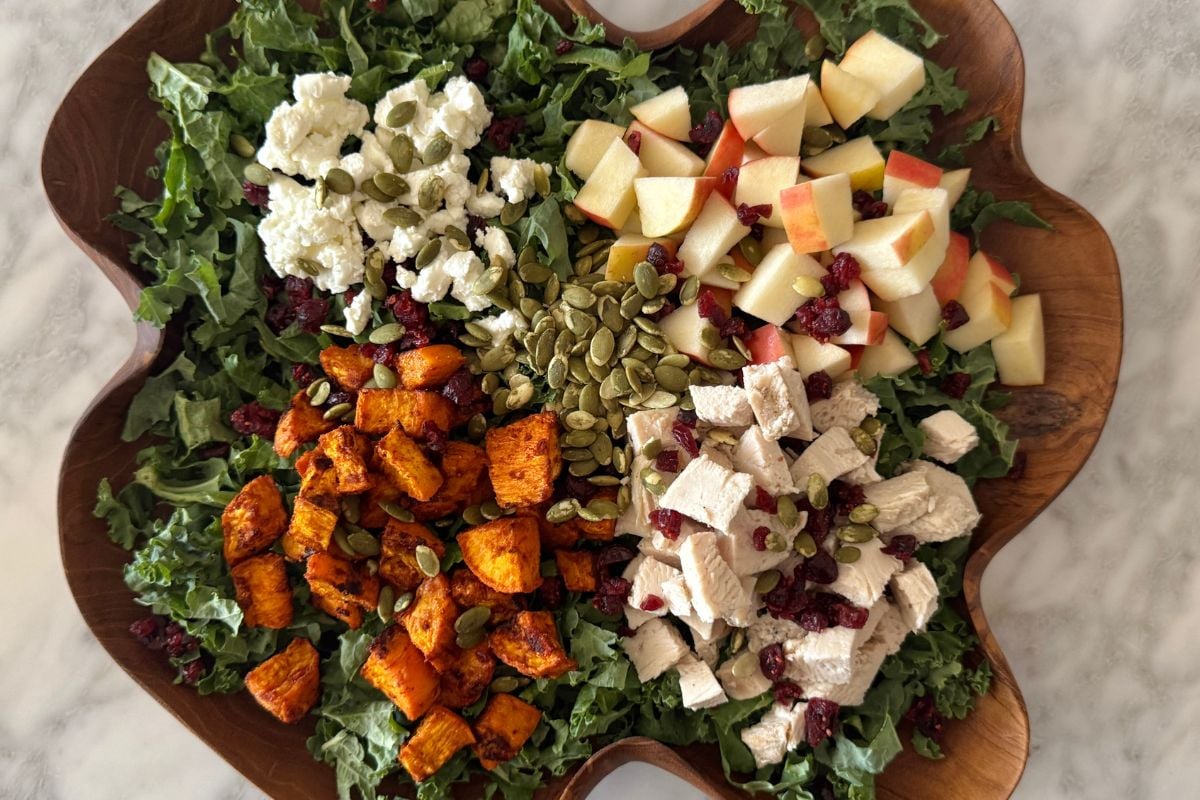 Fall Harvest Salad in a bowl with sweet potatoes and apples | Healthy Foodie Girl Fall Harvest Salad in a bowl with sweet potatoes and apples.