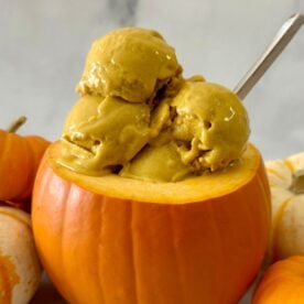 Healthy Ninja Creami Pumpkin Protein Ice Cream in a bowl with fall spices | Healthy Foodie Girl Healthy Ninja Creami Pumpkin Protein Ice Cream in a bowl with fall spices