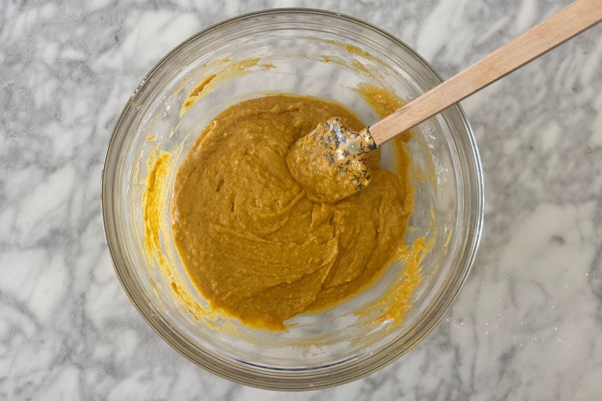 Pumpkin cream cheese muffin batter in a large bowl