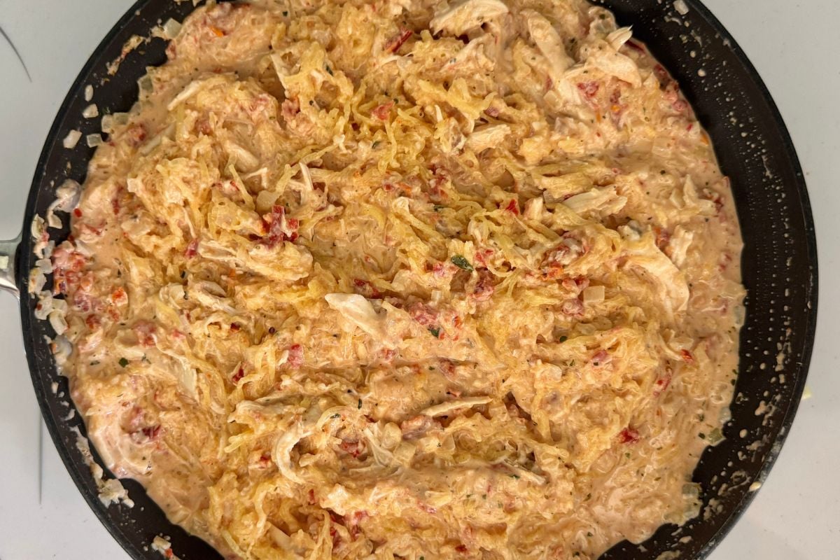 Combined Marry Me Chicken spaghetti squash in skillet
