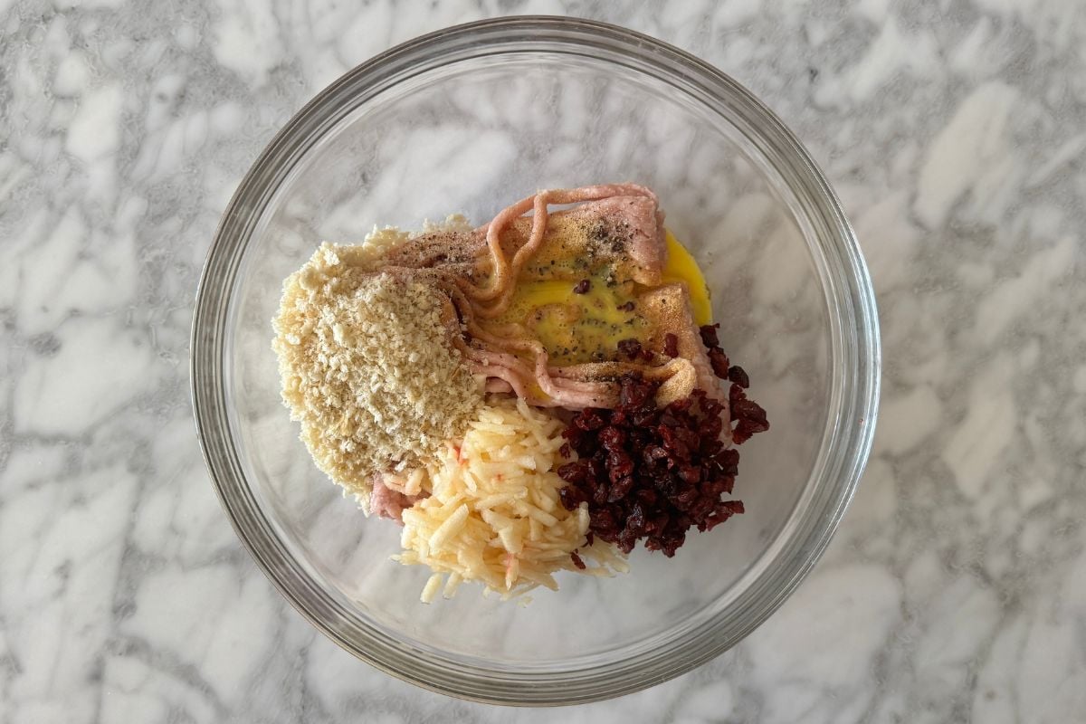 Ingredients for cranberry apple chicken meatballs in bowl