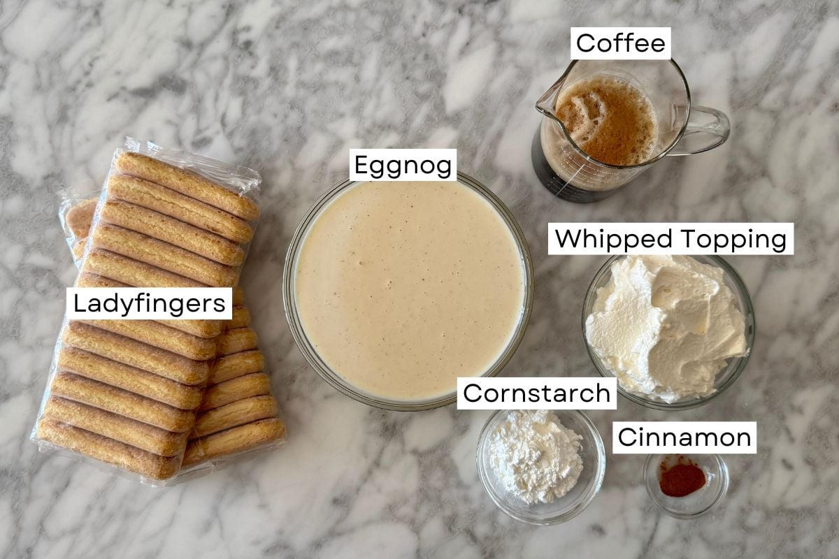 Ingredients for eggnog tiramisu recipe in bowls