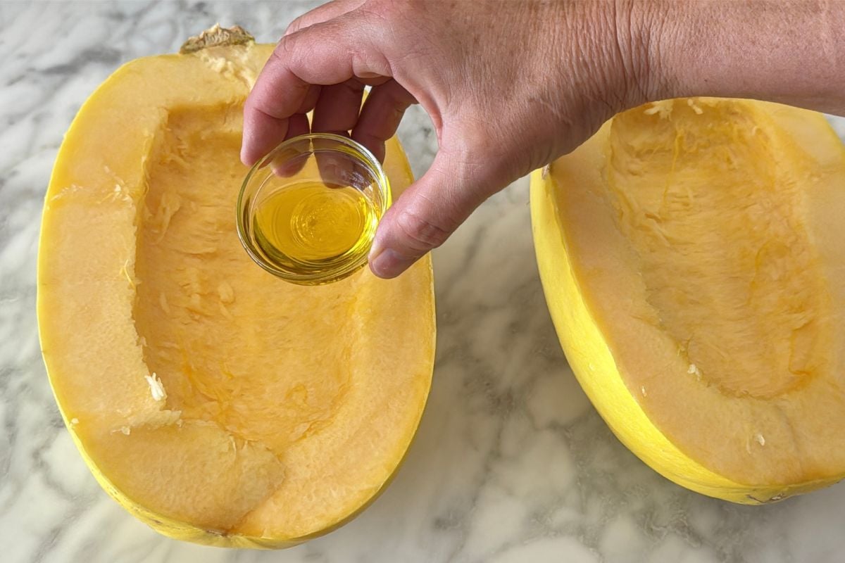 Olive oil in spaghetti squash halves