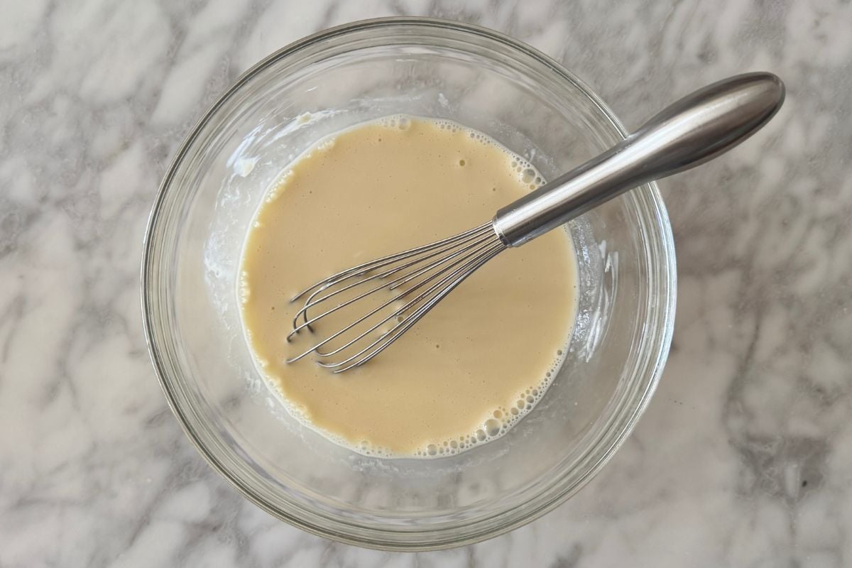 Whisked wet ingredients for sheet pan protein pancakes