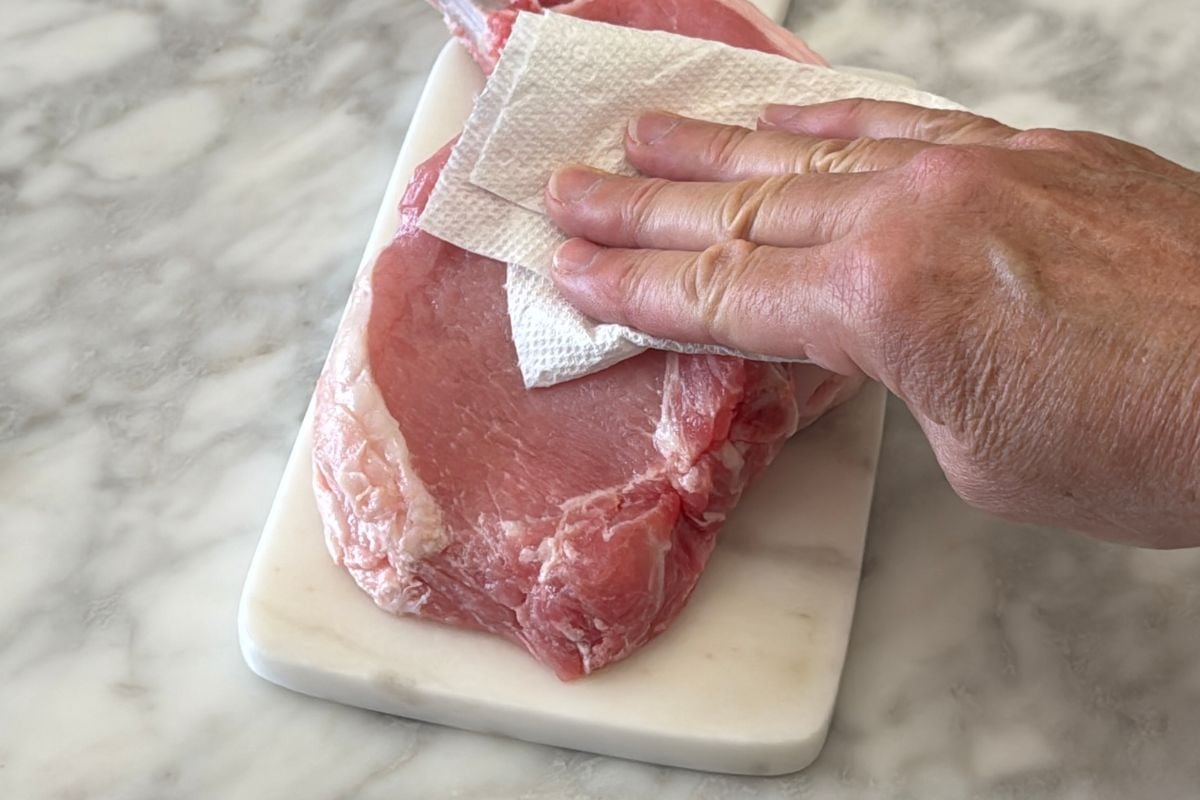 Pork chops pat dry with a paper towel