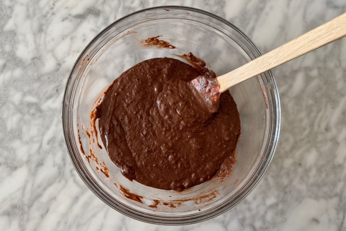 Batter for chocolate Kodiak protein muffins in a bowl | Healthy Foodie Girl Batter for chocolate Kodiak protein muffins in a bowl.
