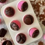 Chocolate Kodiak Protein Muffins in a muffin pan.
