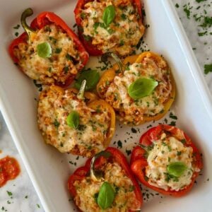 Italian ground turkey stuffed peppers cooked in a baking dish | Healthy Foodie Girl Italian ground turkey stuffed peppers cooked in a baking dish.