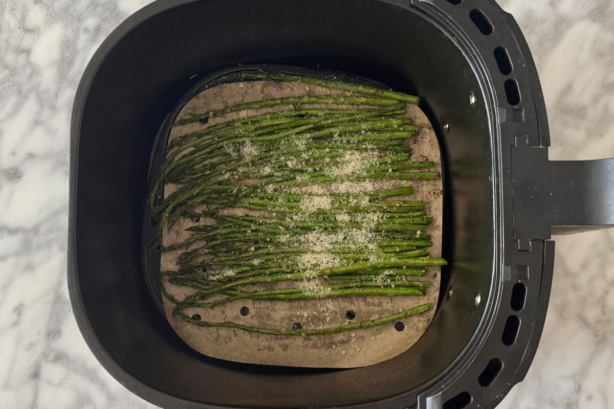 Air fried asparagus sprinkled with Parmesan.