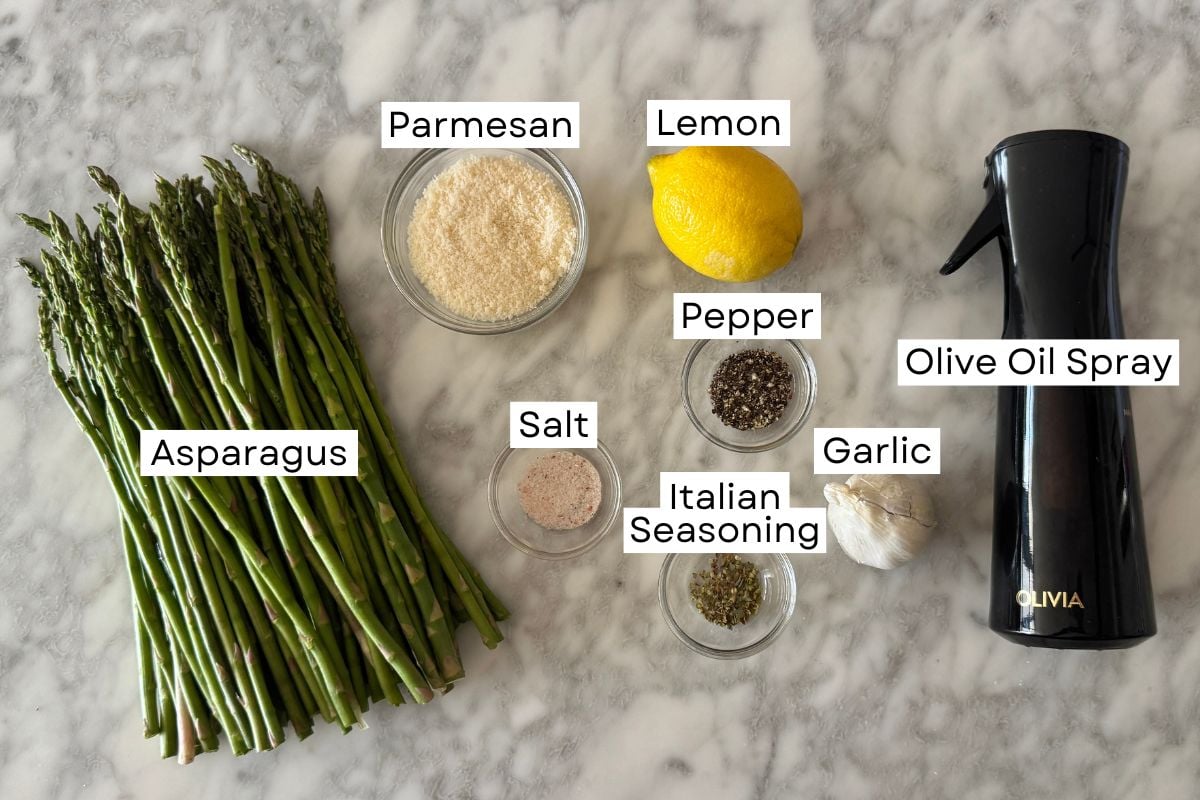 Ingredients for air fryer asparagus in bowls.