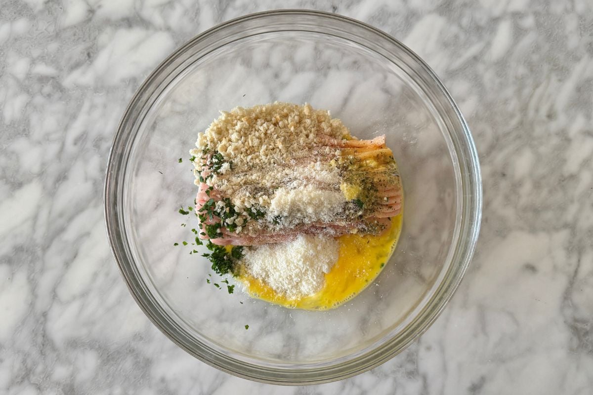 Ingredients for turkey meatballs in a bowl.