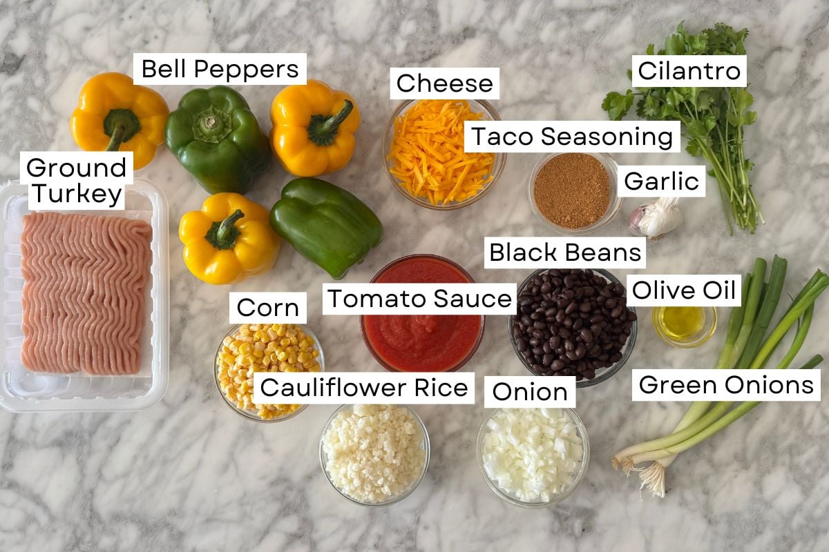 Ingredients needed for healthy Mexican stuffed peppers in bowls.