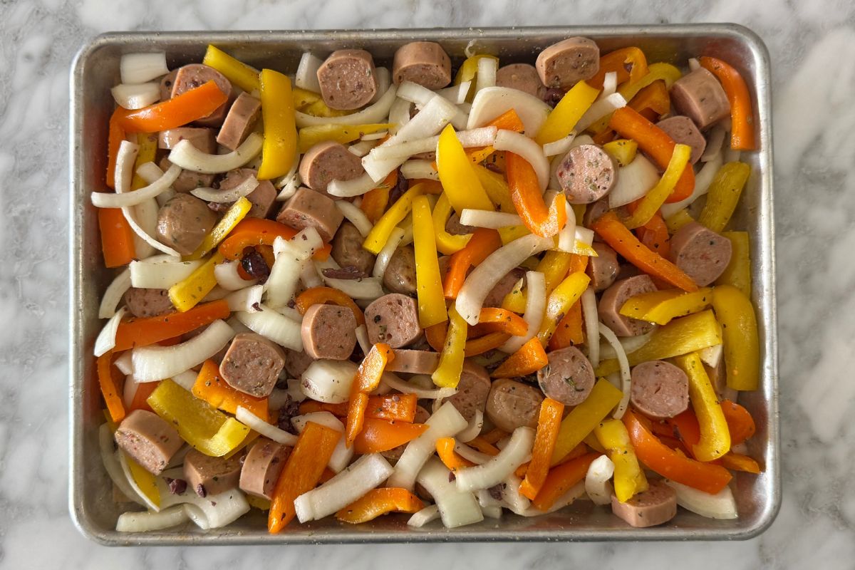 Sausage and peppers on a sheet pan.