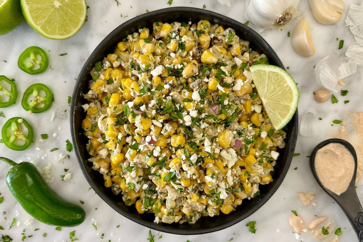 Healthy Mexican Street Corn Salad Without Mayo | Healthy Foodie Girl Healthy Mexican Street Corn Salad Without Mayo in a bowl.