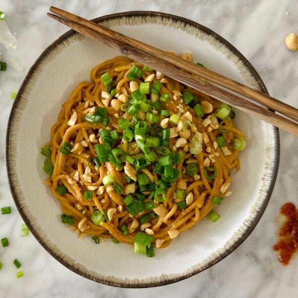 Healthy Spicy Peanut Noodles with PB2 in a bowl.
