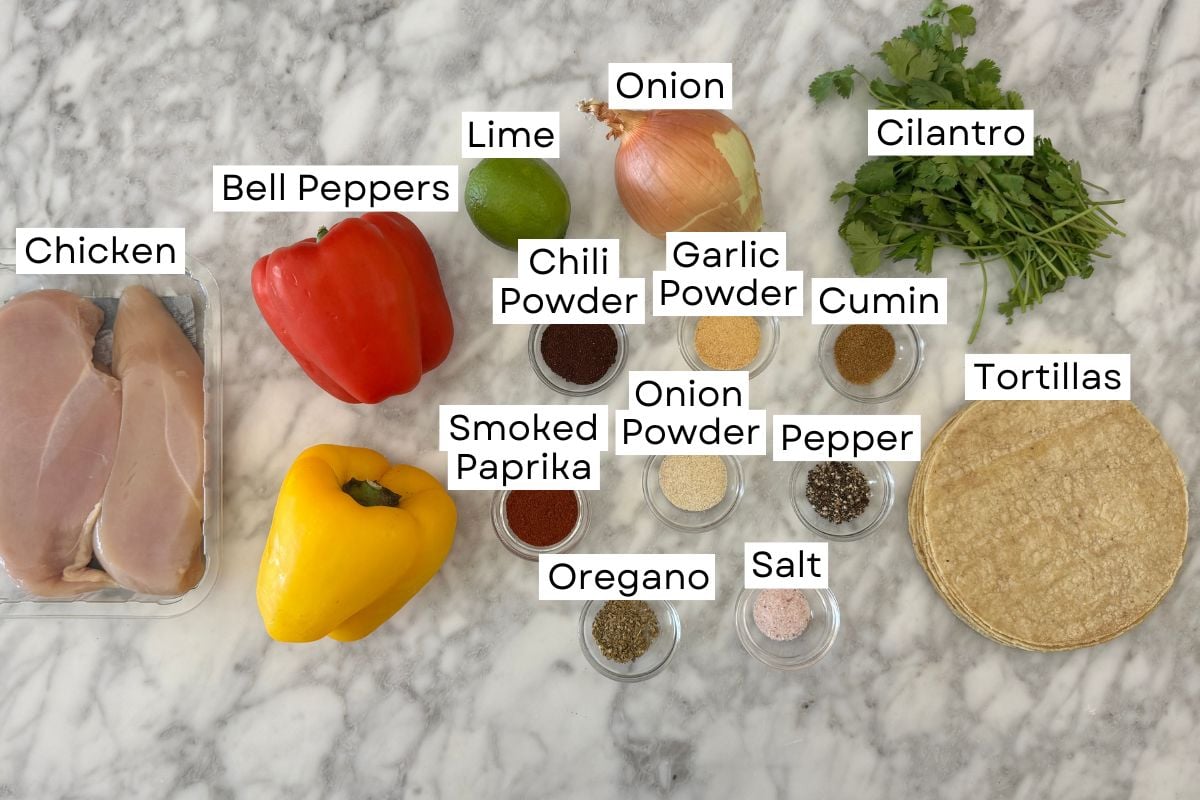 Ingredients for sheet pan chicken fajitas in bowls.