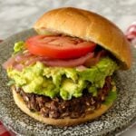 Chipotle Black Bean Burgers with Oats served on a plate.